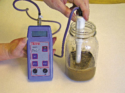 Figure 5.38 - Most portable pH meters will also measure salts (electrical conductivity). Some probes can be directly inserted into the saturated media and a reading taken. The sample is prepared by adding distilled water just to the point when the surface glistens and allowed to come to equilibrium after 15 minutes.